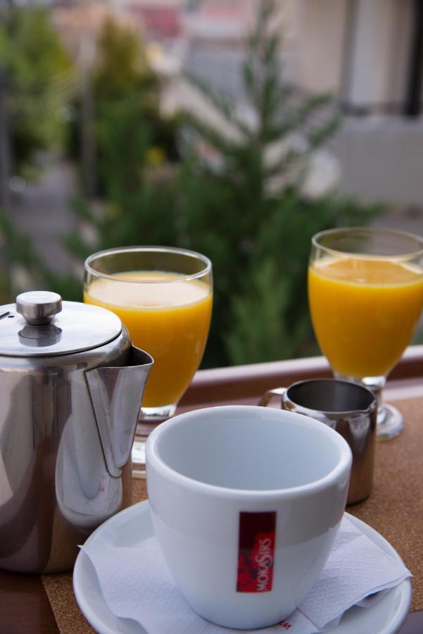 Hotel Maroussi Афины Экстерьер фото